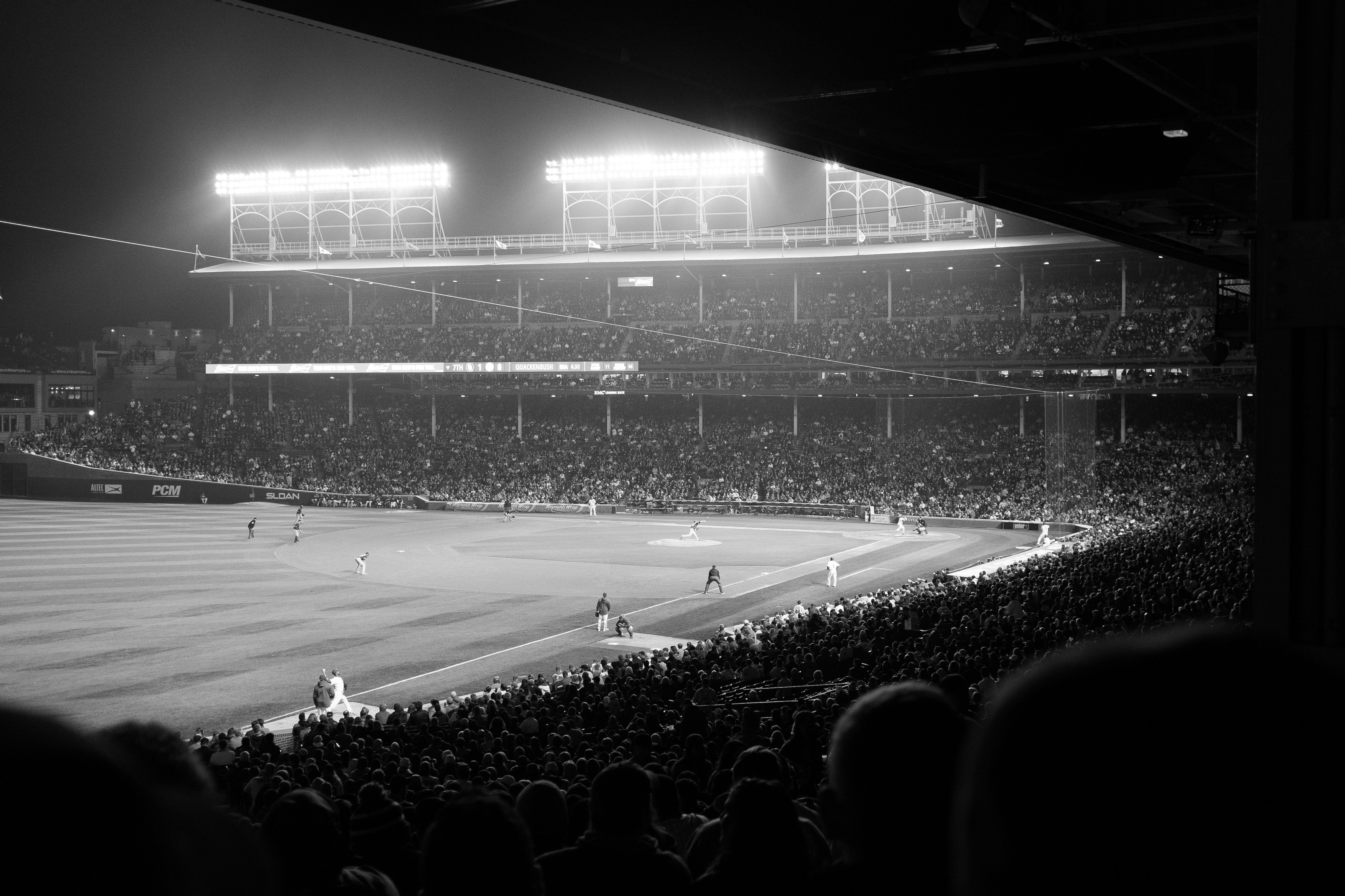 people watching football game on stadium